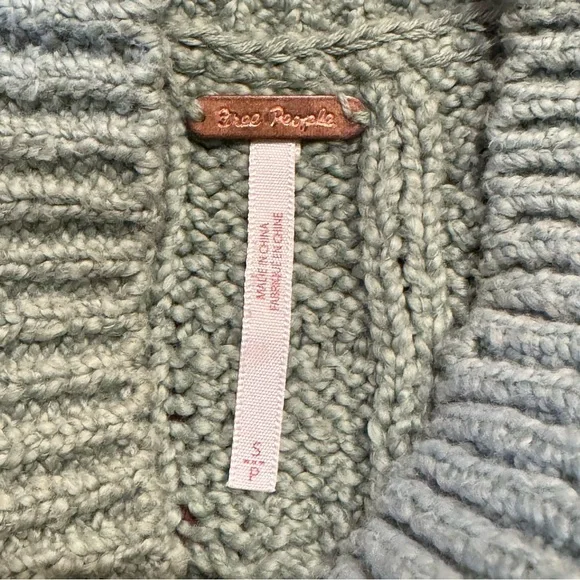 Free People Cropped Cable Knit Sleeveless Turtleneck Sweater in Mountain Mint - Picture 7 of 9